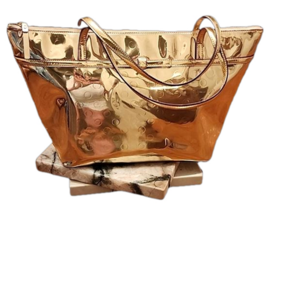 kate spade Handbags - Kate Spade Camellia Street Embossed tote in metallic gold patent leather, GUC